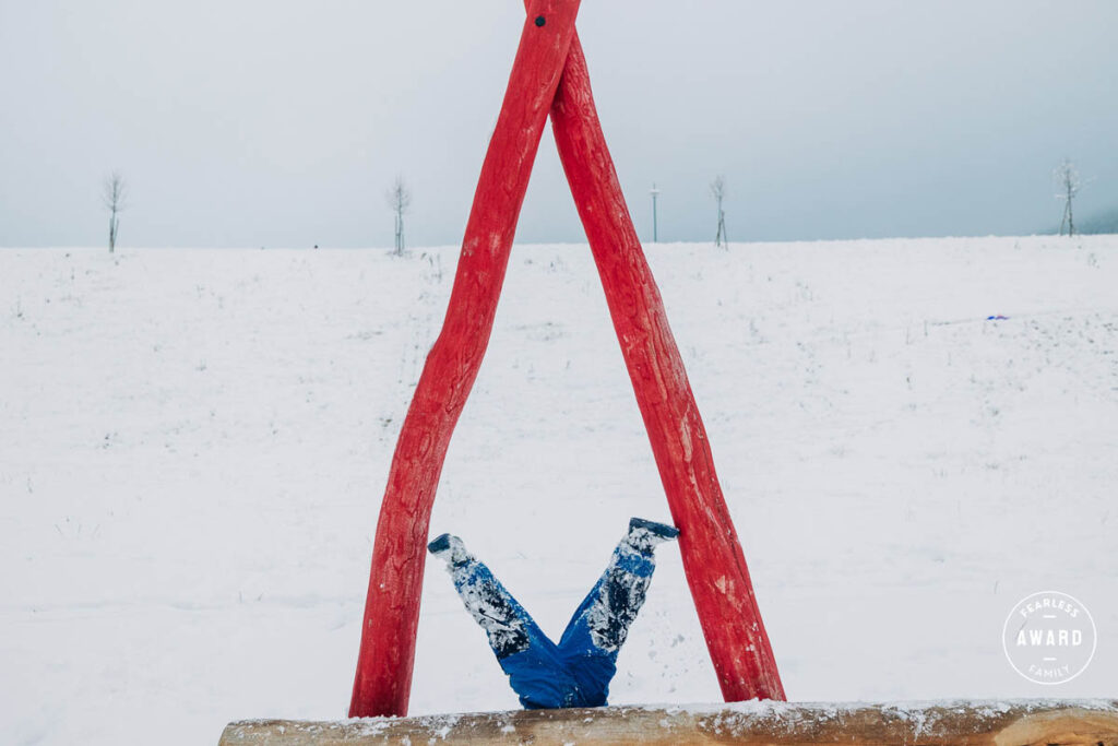 Fearless Family Award by Sabine Doppelhofer I Kid playing in the snow